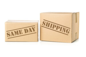 2 boxes on white background with same day shipping stamped on them